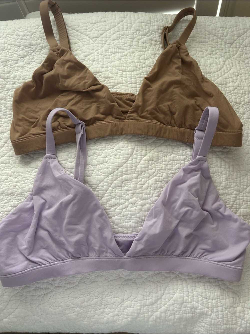2 SKIMS bras